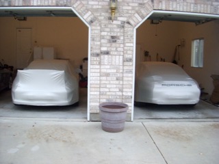 cars covered in garage
